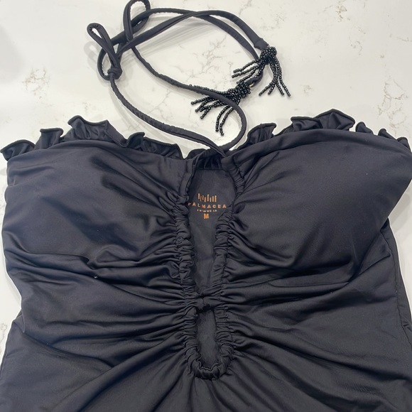 Palmacea, one piece, tied swimsuit with cut outs.  
Size M - Picture 2 of 12
